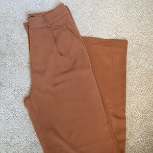 Rust color trousers